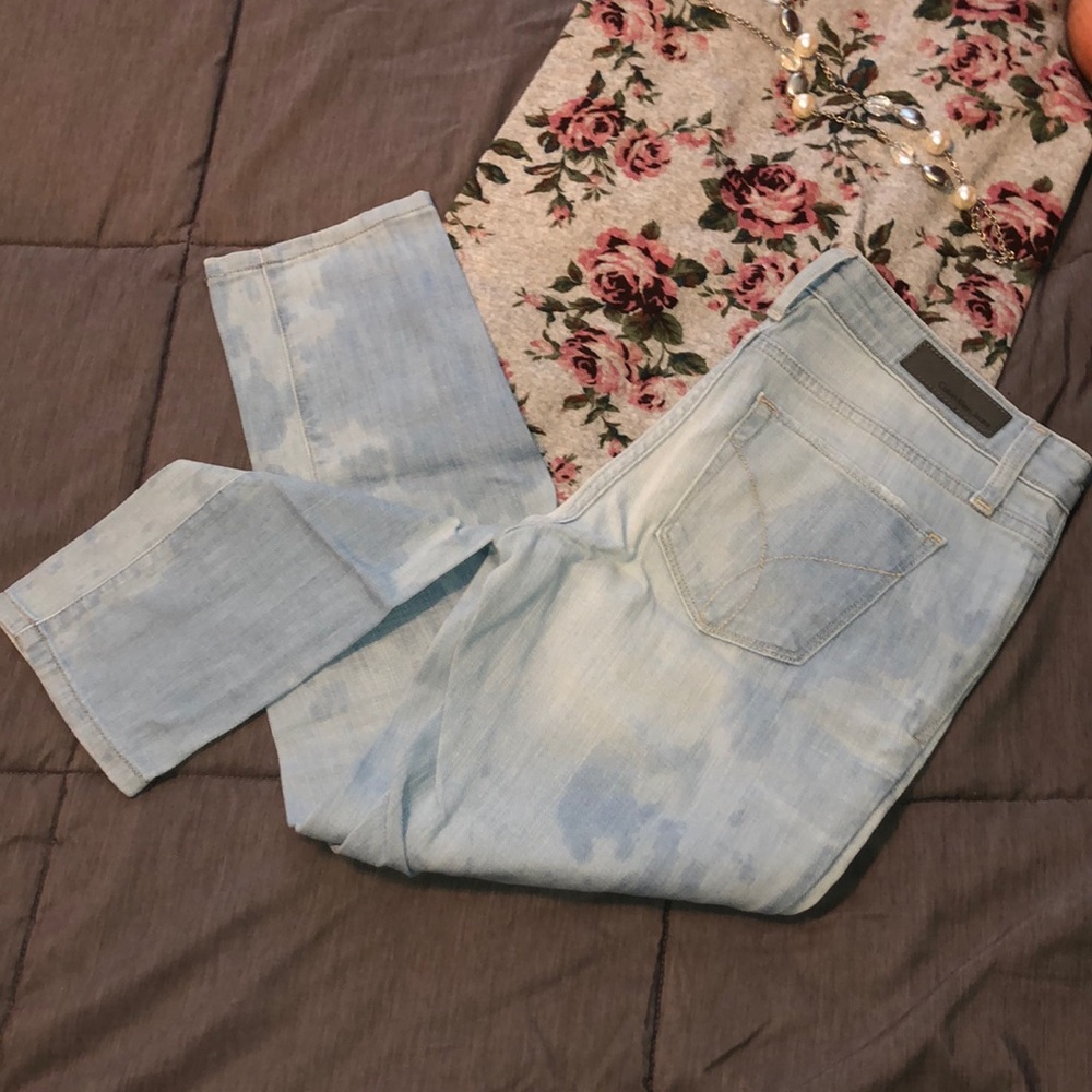 Light wash Distressed/bleached “spotty look” jeans